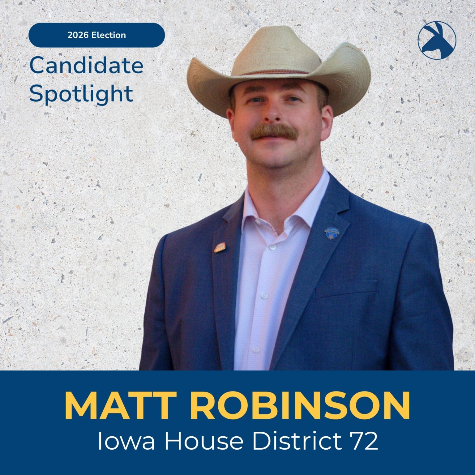 A man wearing a cowboy hat and a suit, identified as Matt Robinson, a candidate for Iowa House District 72 in the 2026 election.
